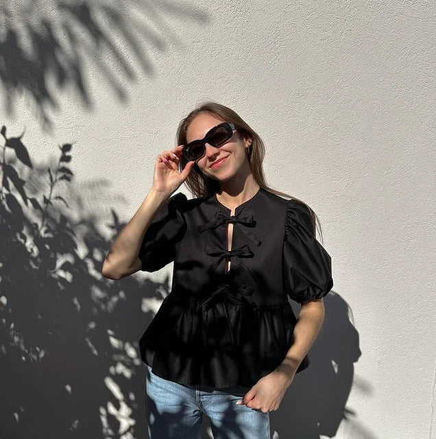 Rosa | Blusa alla moda con stampa leopardata e maniche a sbuffo
