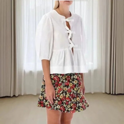 Rosa | Blusa alla moda con stampa leopardata e maniche a sbuffo