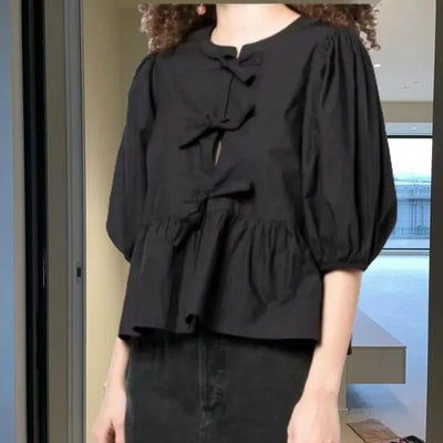 Rosa | Blusa alla moda con stampa leopardata e maniche a sbuffo