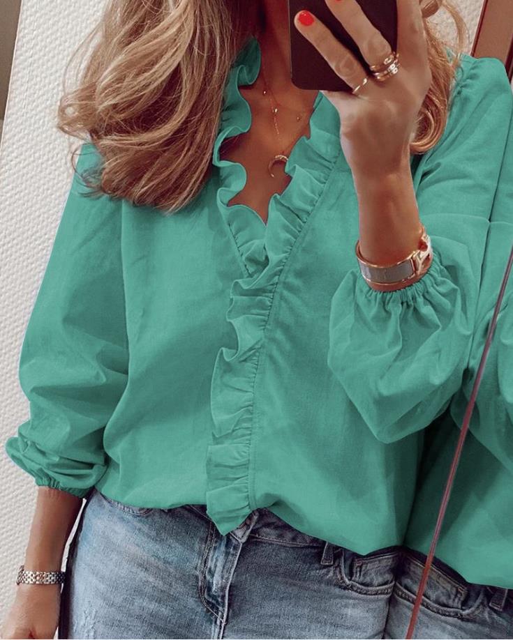Caroline | Blusa con volant e scollatura a V